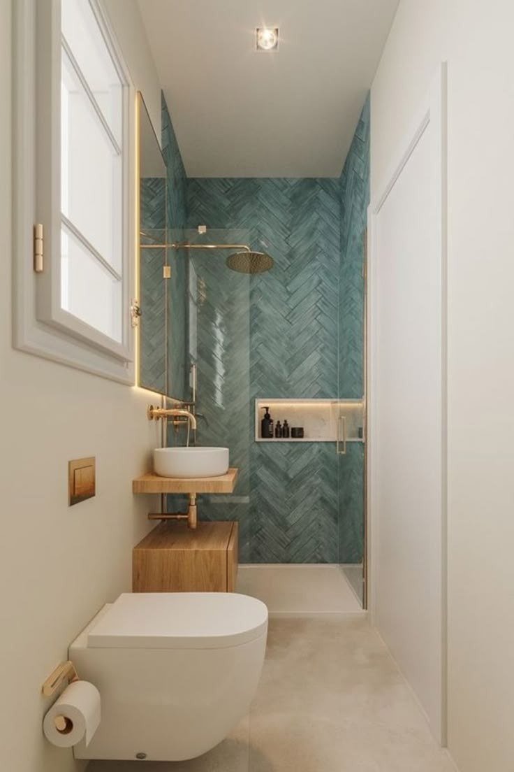 Bathroom — Teal herringbone gold fixture — Maitri Interior Studio project photo