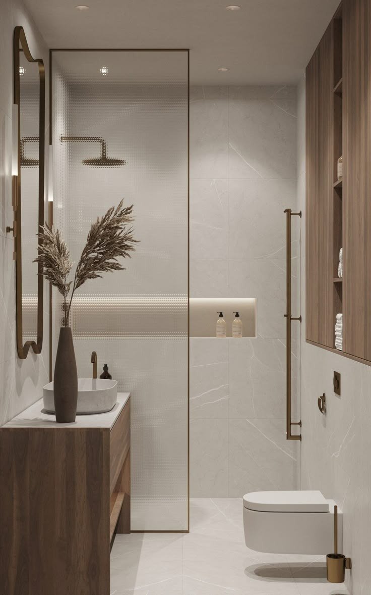 Bathroom — Warm marble brass shower nook — Maitri Interior Studio project photo