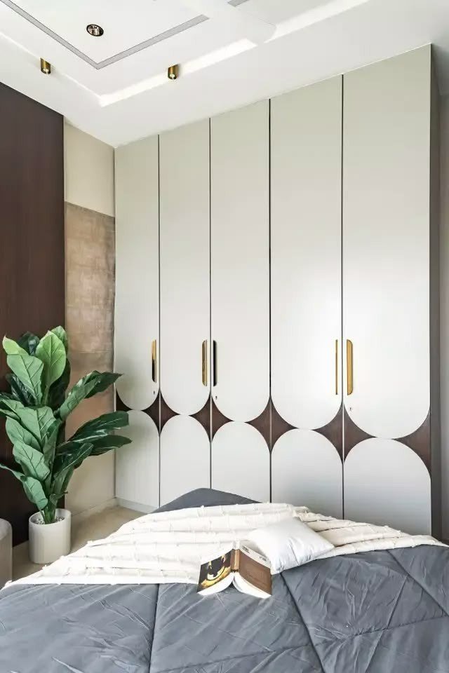Wardrobe & Storage — Scalloped arch gold handles — Maitri Interior Studio project photo