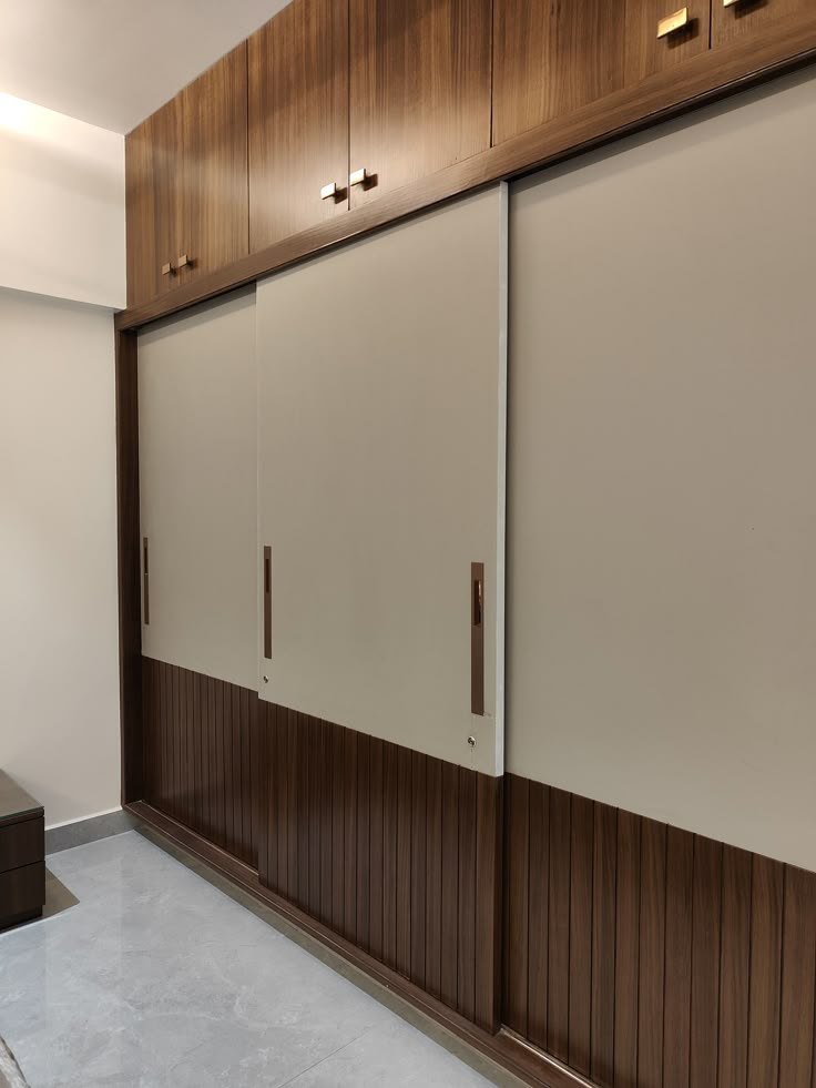 Wardrobe & Storage — Walnut cream sliding doors — Maitri Interior Studio project photo