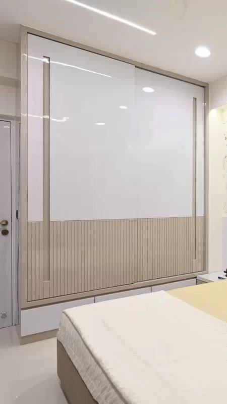 Wardrobe & Storage — White sliding wood base — Maitri Interior Studio project photo