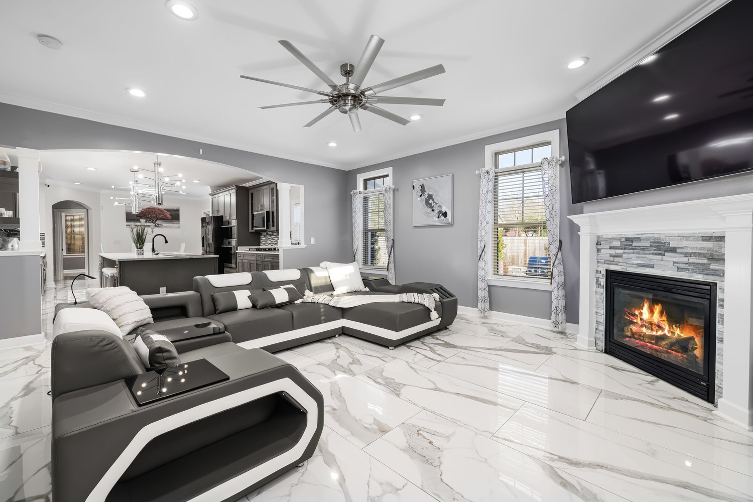 Warm contemporary living room designed by Maitri Interior Studio